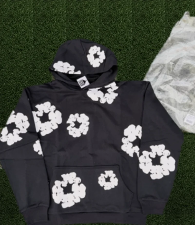 Black floral graphic hoodie on turf