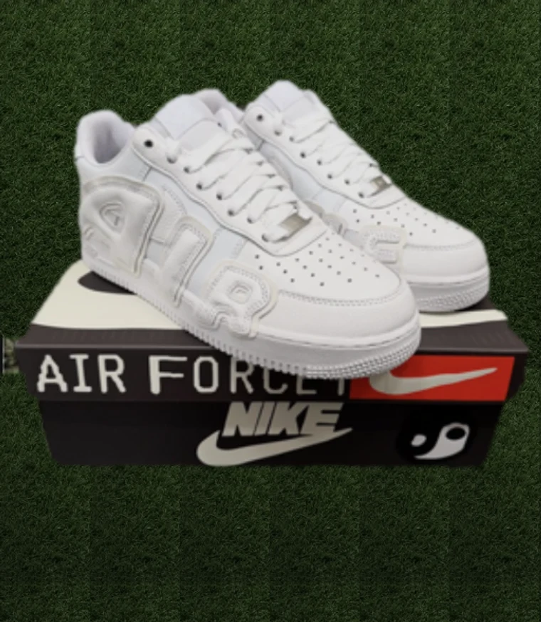 White Air Force 1 sneakers on turf